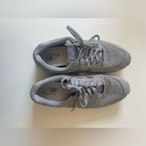 Grey New Balance, gently worn.